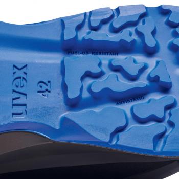 The image shows the underside of a shoe with a non-slip, blue sole. The sole has a textured profile and is marked with the inscription "Uvex 42" and "Fuel-Oil Resistant".