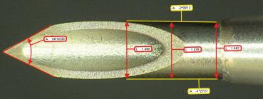 The image shows the tip of a metallic tool. There are several measurement lines with numbers indicating various distances and lengths. The contours are precise and appear technical.