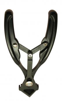 The image shows a black multi-tool with two curved handles that are connected in the middle. At the bottom, there is a pointed area for working on materials.