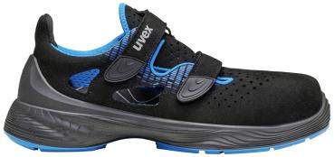 The shoe is black with blue accents. It has two Velcro straps and a breathable surface. The sole is stable and slightly profiled, ideal for everyday use or sports.