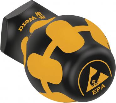 The image shows a round, black-and-yellow button. The surface is predominantly black with yellow symbols, including a recycling symbol and an EPA logo. The button has a flat top.