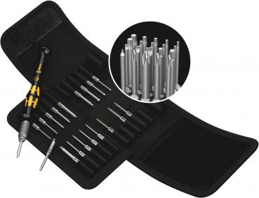 The image shows a toolset with various screwdriver bits in a black storage case. A screwdriver with a yellow handle is lying next to it.