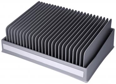 The image shows a gray, rectangular object with many parallel, narrow grooves. It has a flat base and a smooth front, probably a storage tray or organizer.