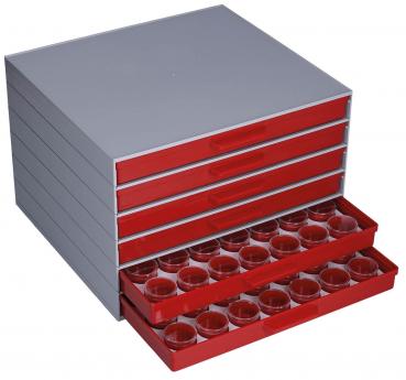 The image shows a gray storage box with red drawers. One drawer is open and contains small round containers. A total of five drawers are visible.