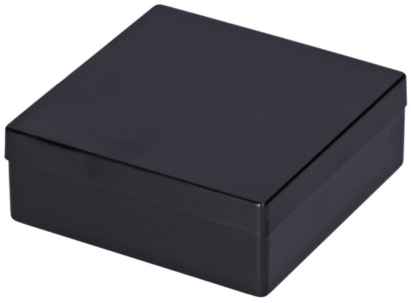 The image shows a square, black box. It has a flat lid and a smooth surface that appears shiny. The edges are right-angled and the box stands stable.