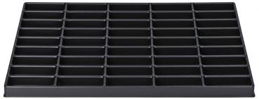 The image displays a black storage compartment with 36 small rectangular compartments, arranged in five rows. It has a flat, rectangular shape.