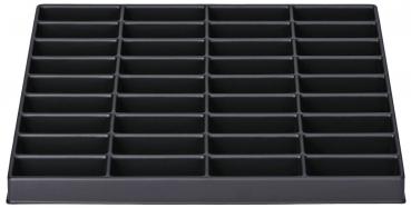 The image shows a rectangular, black tray with 35 uniform compartments. The compartments are arranged in several rows and columns and provide space for small items.