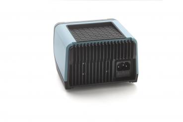 The image shows a compact, rectangular device with a smooth, blue top and vertical, black cooling fins on the sides. There is a connector on the back.