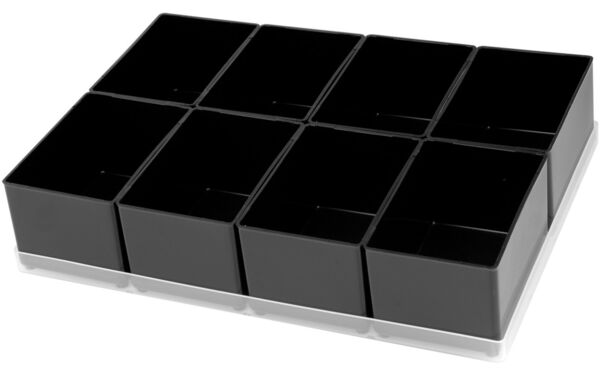 The picture shows a flat box with nine equally sized, square compartments. All compartments are black and arranged in three rows of three compartments each. The box has a clear bottom.