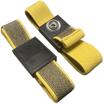 The image shows two yellow wristbands made of durable fabric. One has a black plastic buckle and a snap button opening. They are flexible and appear to be suitable for outdoor use.