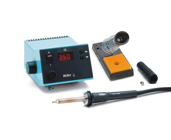 The picture shows a soldering station with a blue device, digital display, and temperature control. It includes a soldering iron, a holder for the iron, and a smoke-free rest.