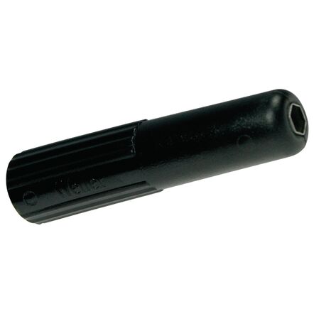 The image shows a black tool attachment, elongated and cylindrical with a hexagonal recess at one end. It has a ridged surface for improved grip.