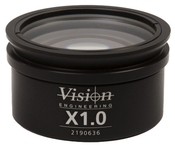 The image shows a black lens with a round shape. On the front, it has the inscription 