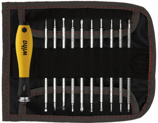 The image displays a black tool roll with red accents. Inside the roll, there are several screwdriver bits, which are slender and vary in length, as well as a yellow screwdriver with a black handle.