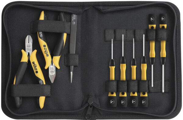 The image shows a black toolbox that is open. It contains various tools with yellow handles, including pliers and screwdrivers in multiple sizes.