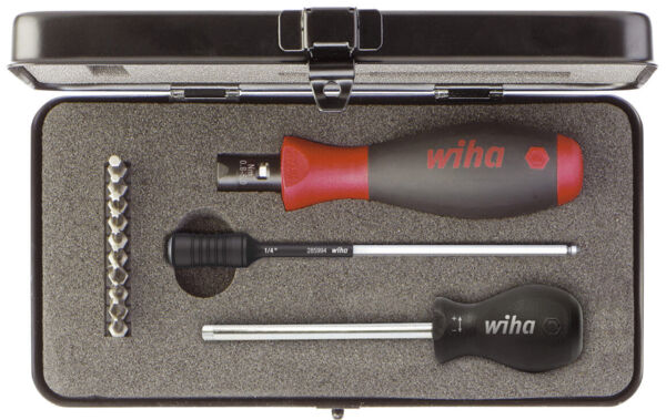 The image shows a toolset in a rectangular, black box. Inside, there is a screwdriver with a red and gray handle, an extension piece, a bit, and a small screwdriver.