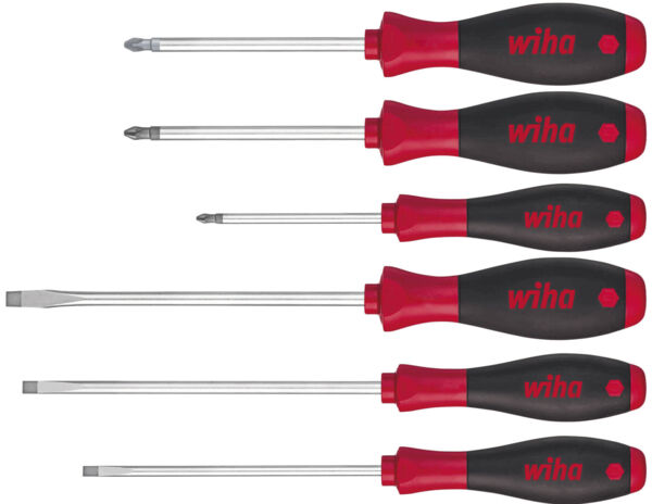 The image shows six screwdrivers in a row. They have black handles with red elements. The blades are made of metal and come in various sizes and shapes, including Phillips and flathead screwdrivers.