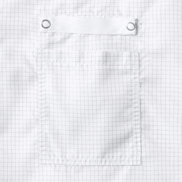 The image shows a white fabric with a fine, checkered pattern. In the center, there is a small, sewn-on pocket with a simple, straight edge and two metal eyelets at the top.