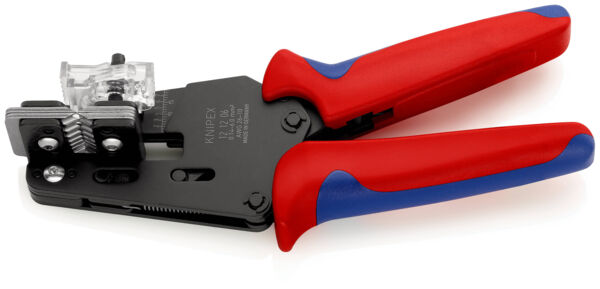 The image shows a crimping tool with black and red-blue handles. It has a metallic working surface with a transparent cover used for processing cables.