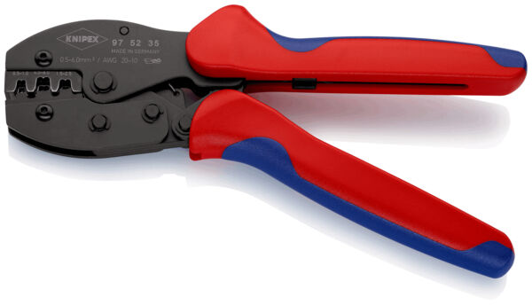 The image shows a crimping tool with red and blue handles. The tool has a black, textured working surface with various notches for crimping cable connections.