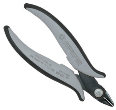 The image displays a sleek pair of pliers with gray, ergonomically shaped handles and a black cutting edge. The pliers feature a curved design and a central screw head.