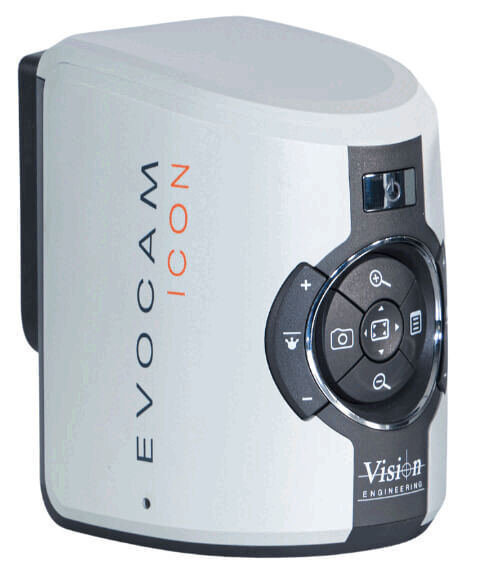 The image displays a compact, modern camera in light gray with a circular control panel. On the casing, the words "EVOCAM ICON" and the logo of "Vision Engineering" are visible.