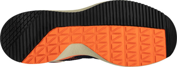 The image displays the underside of a shoe with a treaded sole. The main part is black with a non-slip pattern, while one section features orange embossments.