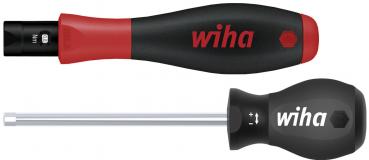 The image shows two screwdrivers. The top one has an ergonomic handle in black and red, the bottom one is entirely black with a round handle. Both are from the brand Wiha.