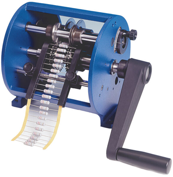 The image shows a blue machine with a handle. It has a rotating axis and contains multiple spools. Attached to it is a series of small resistors, which are neatly arranged.