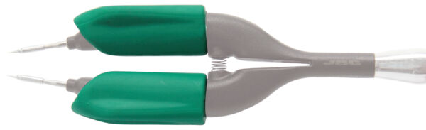 The image shows a double-ended pen with two green grips and a gray middle section. At each end, there are fine, pointed tips for writing or drawing.