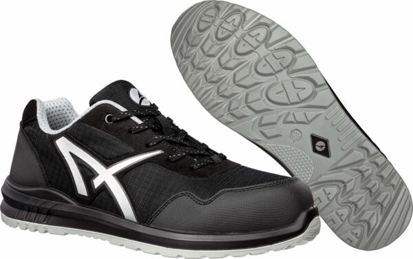 The image displays black safety shoes with gray details. They feature a modern design and a non-slip sole. The laces are easily adjustable, and the fabric appears durable.