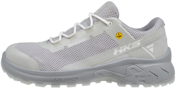 The shoe is lightweight and made of gray, breathable material. It has a non-slip rubber sole and laces in the middle. The design is simple and modern, ideal for sports and leisure.