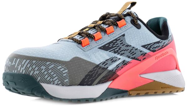 The shoe is sporty with a light blue, textured surface. Black-gray accents and orange details on the side are striking. The laces are also black with orange elements.