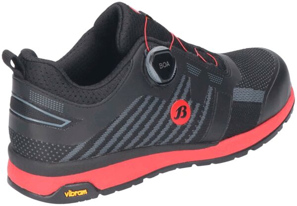 The shoe is black with red accents. It features a modern design and a special lacing technology (BOA). The sole is marked in yellow and ensures good grip.