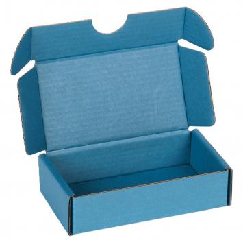 It is an empty, rectangular cardboard box in a rich blue tone. The box has a flap on top that is slightly open, and it is also blue inside. It has a simple, functional shape.