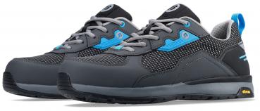 The image shows a pair of gray shoes with blue and black accents. They have a sturdy sole and flat laces, ideal for athletic activities or everyday wear.