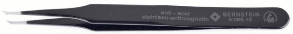 The image shows a black stainless steel tweezer. It has a smooth handle and sharp, narrow tips. The surface features inscriptions indicating the material and brand.