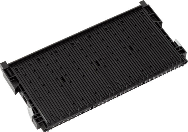 The image shows a rectangular, flat object made of black plastic with many parallel grooves. It has small brackets on the sides.