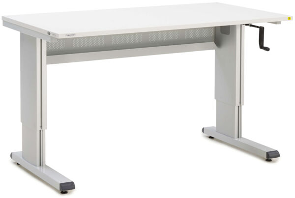 The table is rectangular with a white surface. It has two gray, sturdy legs and a hand crank on the side to adjust the height. There are ventilation slots under the tabletop.