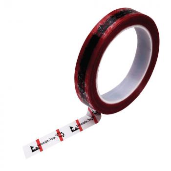 The image displays a roll of tape. The outer layer is red with a black pattern. A white roll is visible in the center, with the tape hanging out from the side, feeling firm.