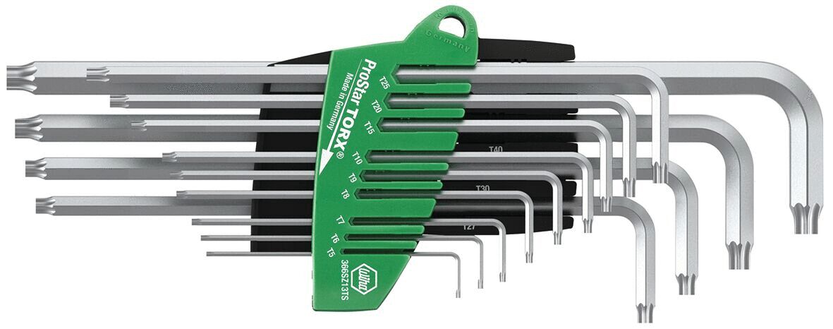 The image shows a collection of hex keys in various sizes. They are made of metal and slightly curved, arranged in descending order of size, with a green holder.