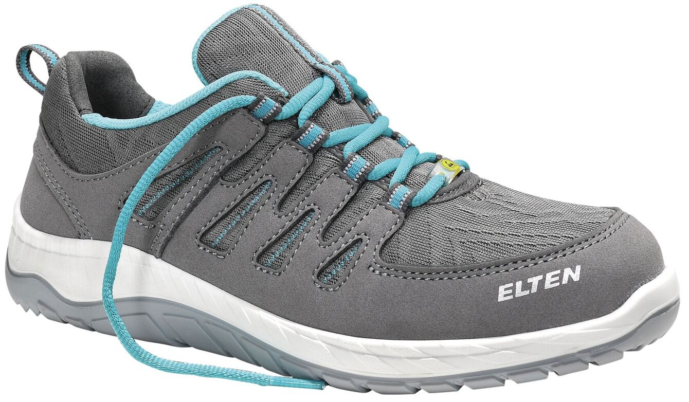 The shoe is gray with light blue shoelaces. It has a sporty design with breathable upper material and a sturdy, white sole. The logo "ELTEN" is visible.