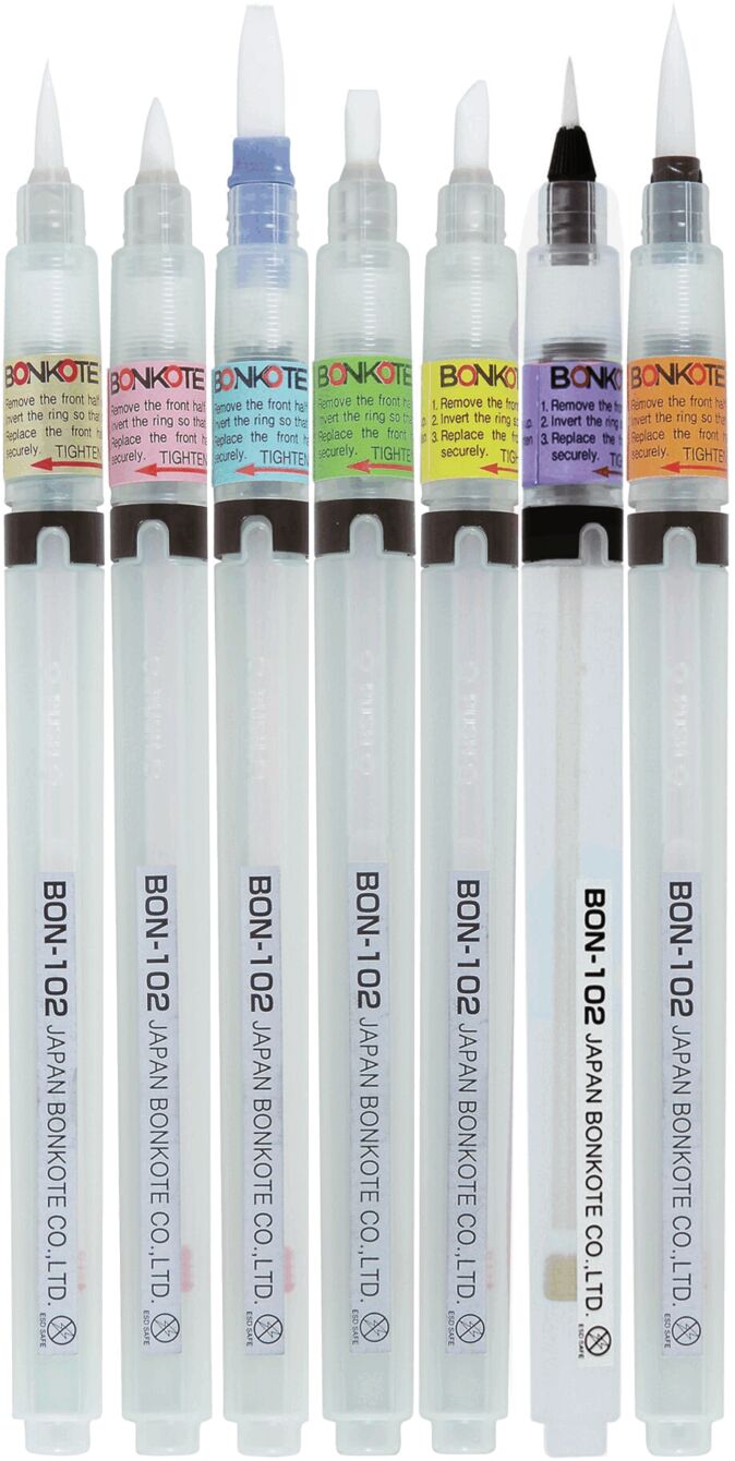 The image shows seven transparent pens in a row. Each pen has a different tip shape and color code, with a print on the body indicating the brand.