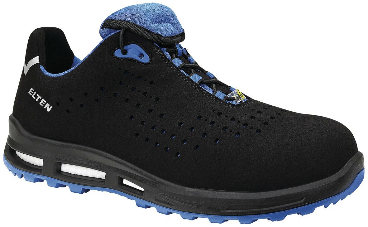 The shoe is black with blue accents. It has a non-slip sole, oval laces, and ventilation holes. The front is reinforced to provide protection.