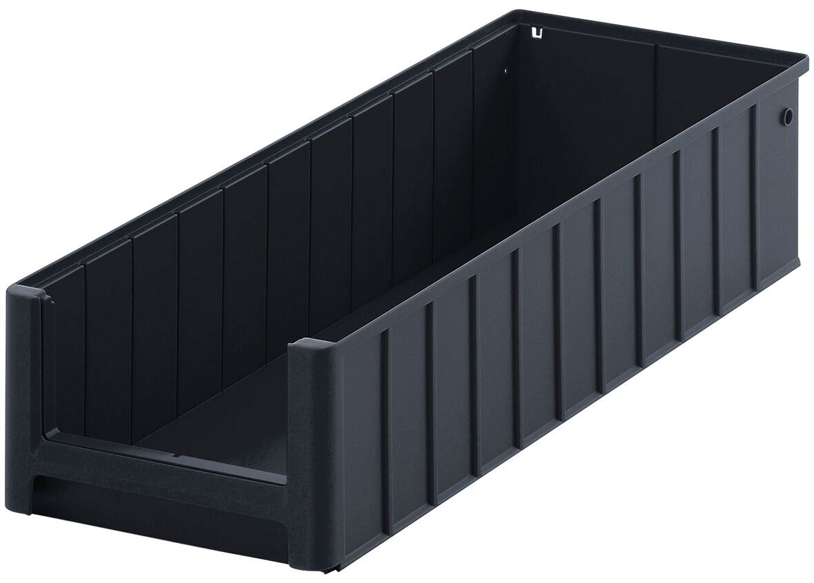 The image shows a rectangular, flat storage box made of black plastic. It has vertical ridges on the sides and is open, without a lid. Ideal for organizing items.