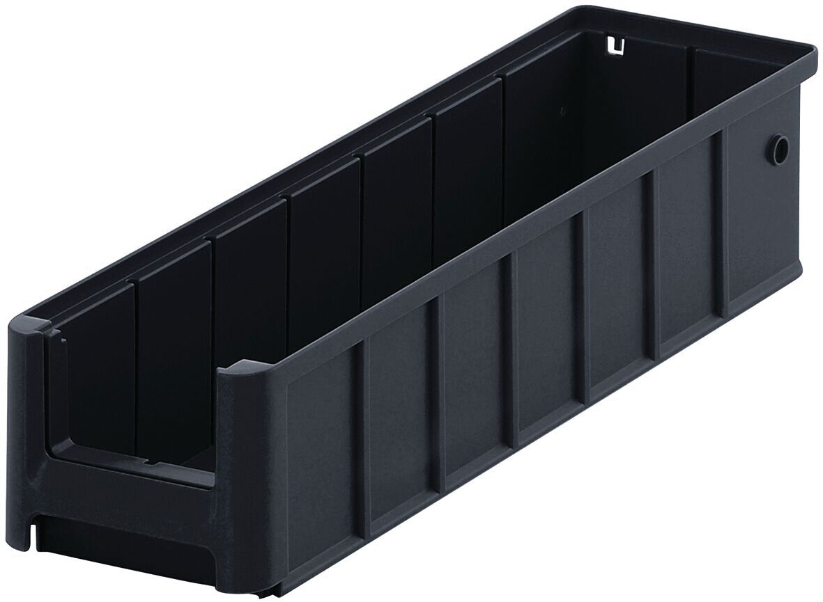 It is a long, rectangular container made of black plastic. The walls are slightly wavy and there is an opening on one side. The container does not have a lid.