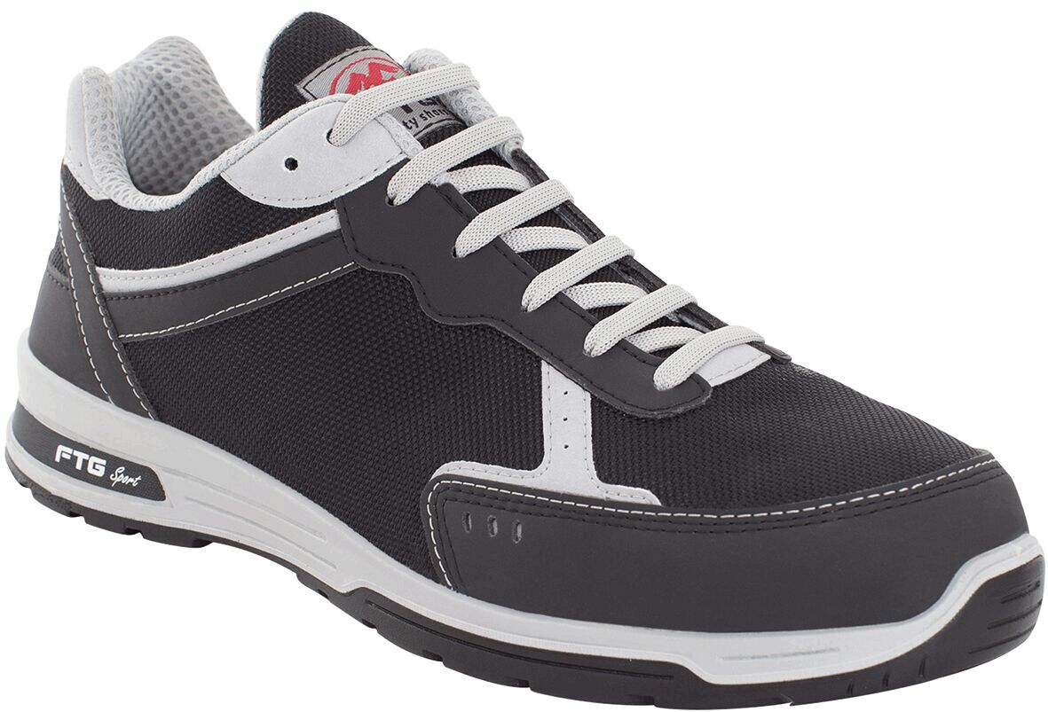 The shoe is a sporty sneaker in black with white details. It has flat laces, a padded tongue, and a rubberized sole that provides good grip.