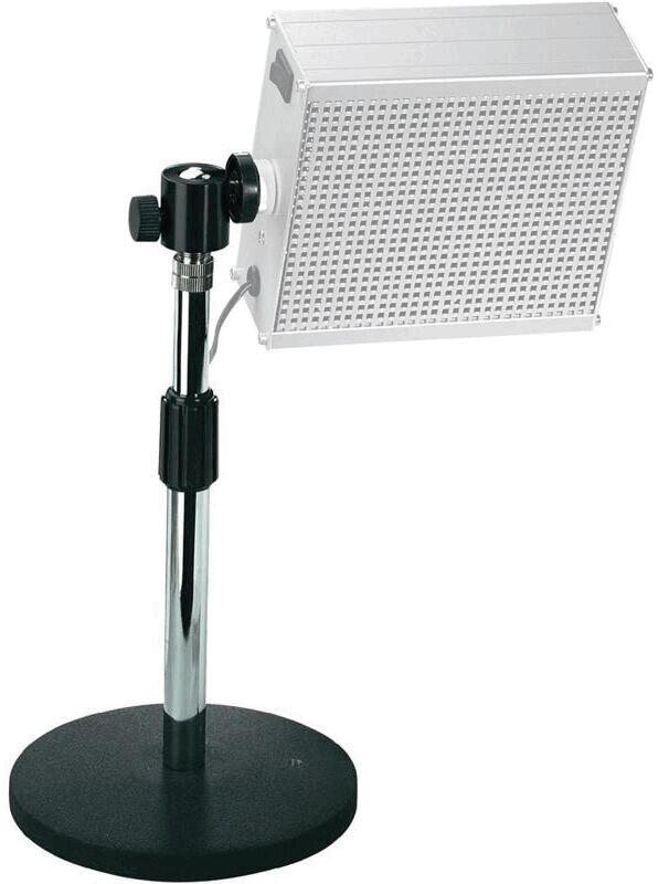 The image shows a table lamp with a square, white lampshade mounted on an adjustable metal frame. The base is round and black.