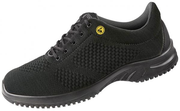 The shoe is black and features a lightweight, breathable upper. It has laces and a non-slip, textured sole for good grip. Sporty and comfortable.