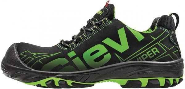 The shoe is lightweight and sporty, predominantly black with green accents. It has a non-slip sole, laces, and a reinforced toe cap for extra protection.